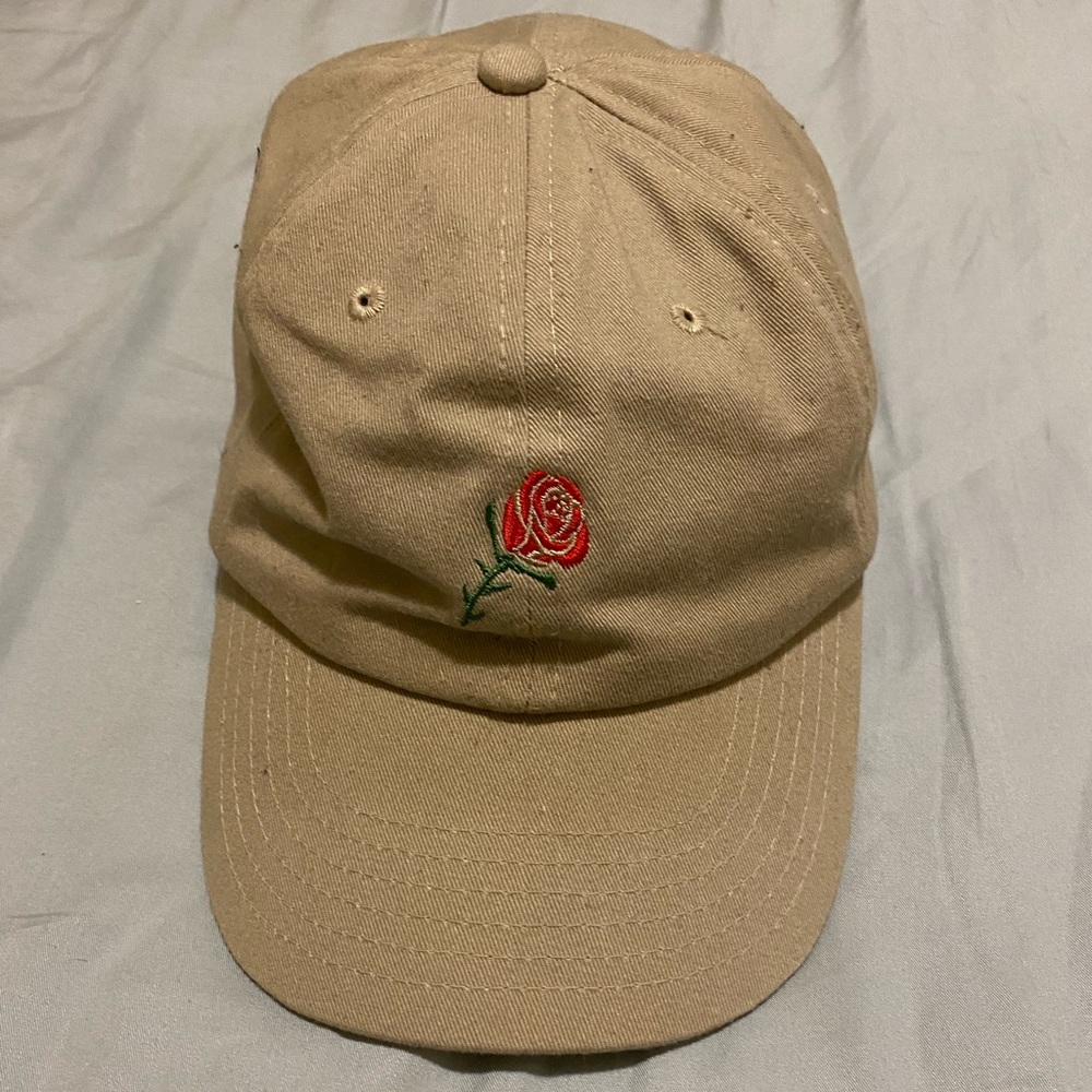 tan baseball cap with rose